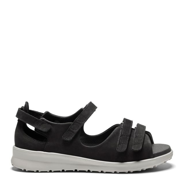 Women´s sandal with adjustable velcro straps and half-open heel cap