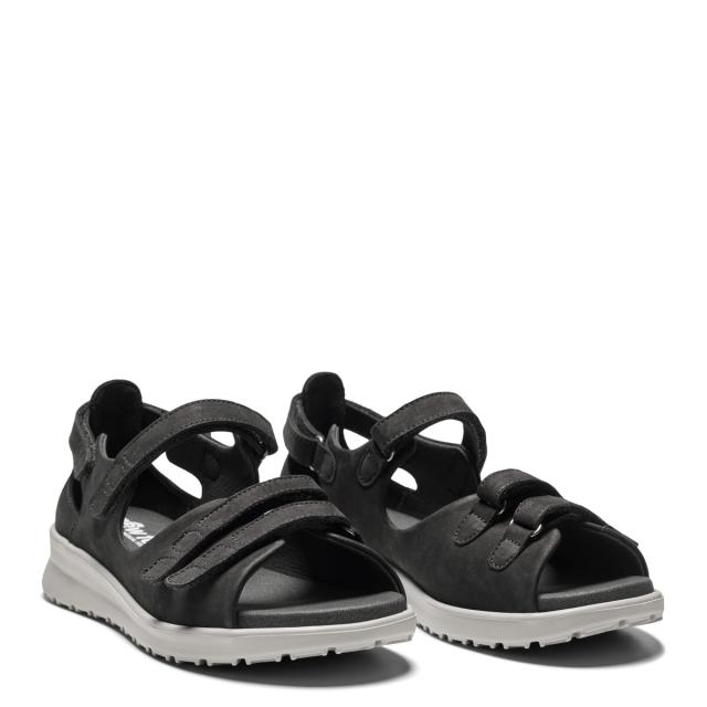 Women´s sandal with adjustable velcro straps and half-open heel cap