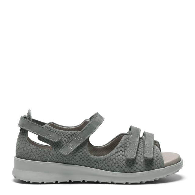 Women´s sandal with adjustable velcro straps and half-open heel cap