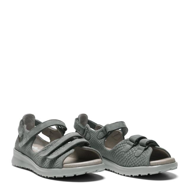 Women´s sandal with adjustable velcro straps and half-open heel cap