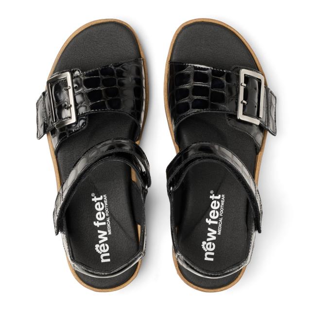 Women's sandal with adjustable velcro strap and buckle