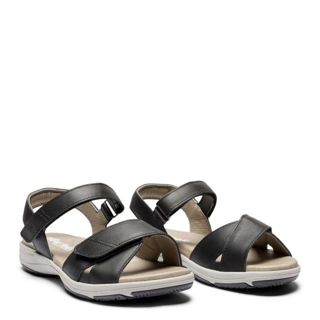 Women´s sandal with heel strap and two velcro straps