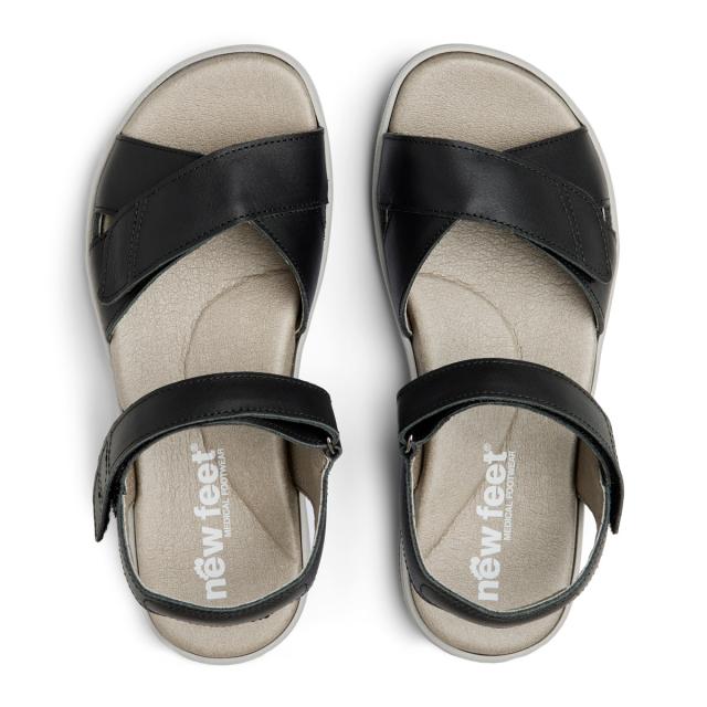 Women´s sandal with heel strap and two velcro straps